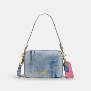 Coach Outlet Carey Crossbody Bag In Loved Denim With Charms